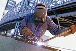 Construction worker welding