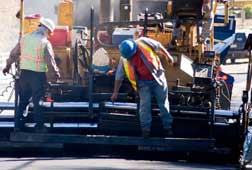 Crew working on DOT FHWA road construction project